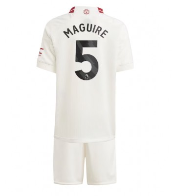 Manchester United Harry Maguire #5 Tercera Equipación Niños 2023-24 Manga Corta (+ Pantalones cortos)